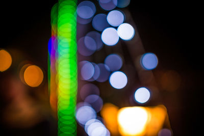 Close-up of illuminated lights at night