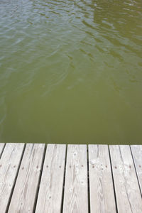 High angle view of wooden pier over lake