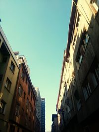 Low angle view of buildings against clear sky
