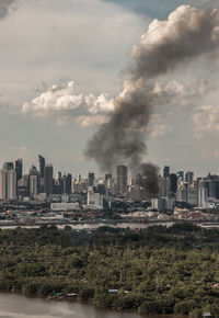 Buildings in city against sky