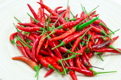 High angle view of red chili peppers on table