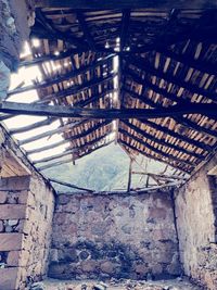 Low angle view of old ceiling of building