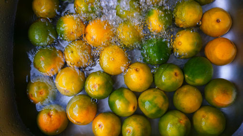 Clean oranges, ready to eat.