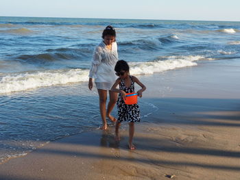 Full length of woman on beach