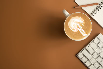 Close-up of coffee cup on table