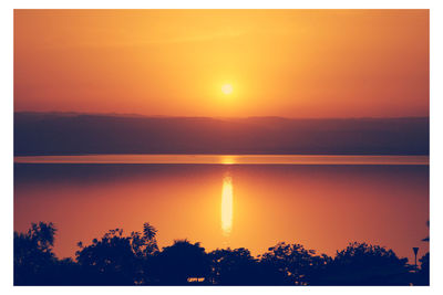 Scenic view of sunset over sea