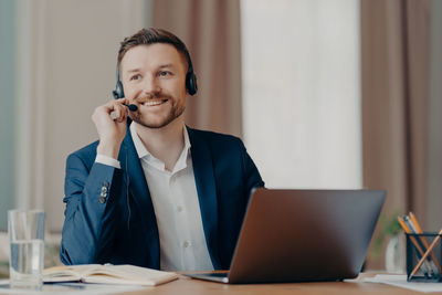 Mid adult man using smart phone