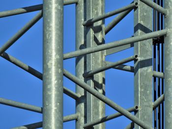 Low angle view of metallic structure against sky