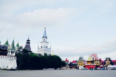 View of mosque against cloudy sky