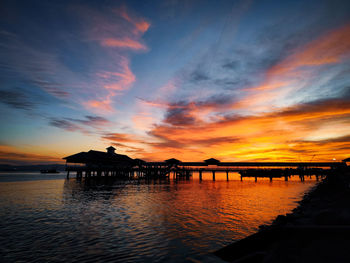 Evening sunset view at tawau jetty with beautiful dramatic colored sky