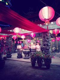 Illuminated lanterns at night