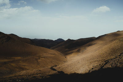 Road through the mountains and clouds