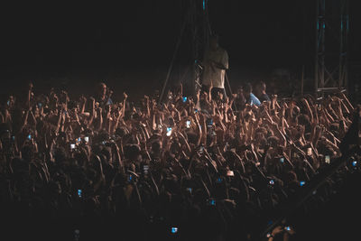 Group of people in the dark