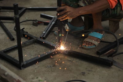 Man working on metal