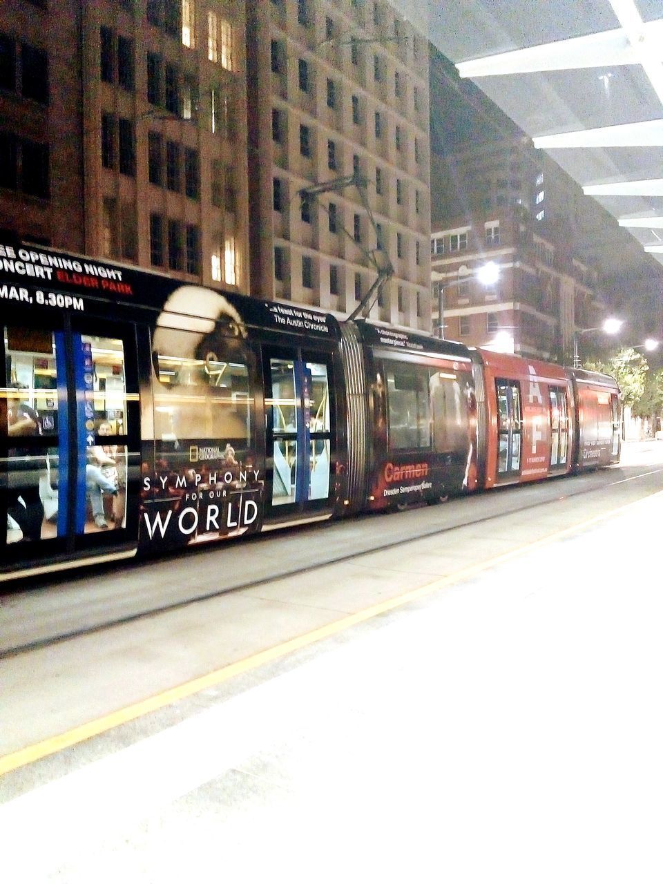 TRAIN AT RAILROAD STATION PLATFORM