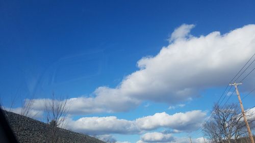 Low angle view of vapor trail in sky