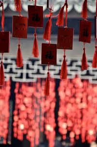 Close-up of lanterns hanging in temple