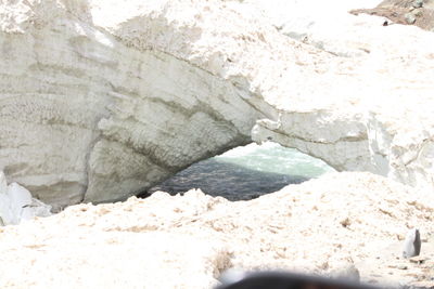 Close-up of rocks by water