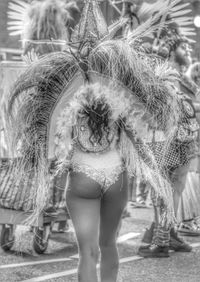 Rear view of woman standing outdoors