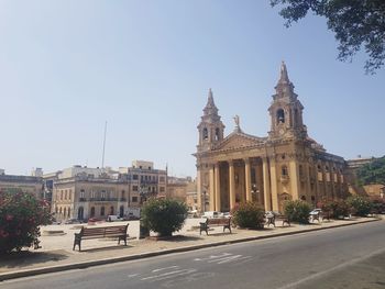 View of buildings against clear sky