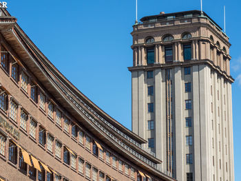 Low angle view of buildings against clear sky