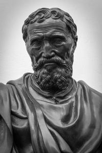 Close-up of statue against gray background