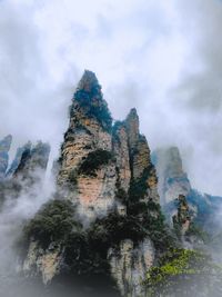 Scenic view of rock formation against sky