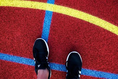 Low section of person on sports track