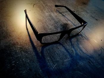 High angle view of empty chair on table