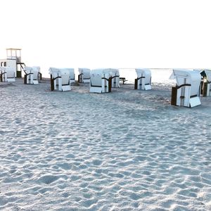 Scenic view of beach against clear sky