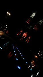 Low angle view of illuminated city at night