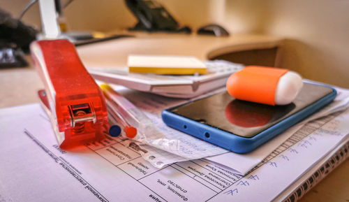 Close-up of mobile phone on table