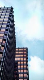 Low angle view of modern building against sky