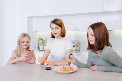 Portrait of happy family at home