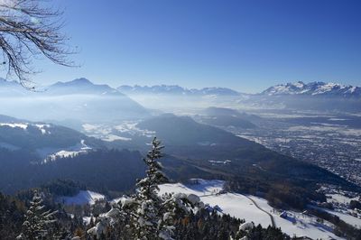 Scenic view of snowcapped mountains against sky