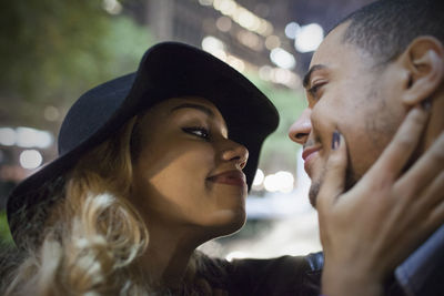 Young couple gazing lovingly into each other's eyes