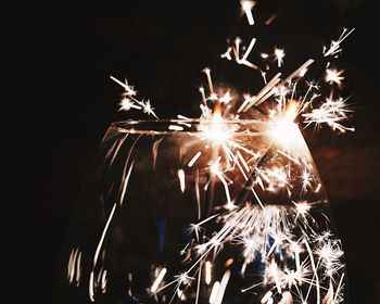 Close-up of firework display at night