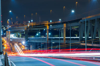 High angle view of light trails on road at night