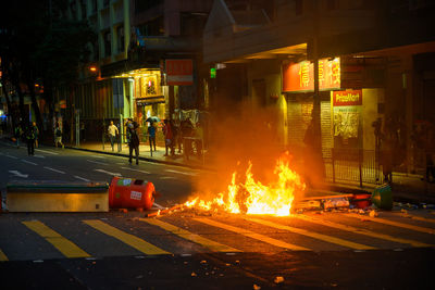 View of fire on street at night