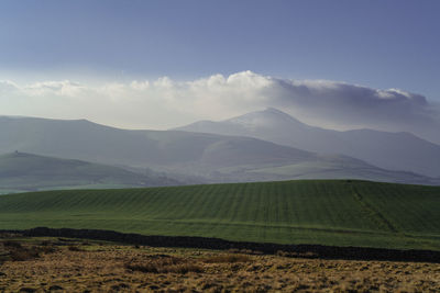 Scenic view of mountains against sky