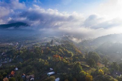 Aerial view of townscape against sky