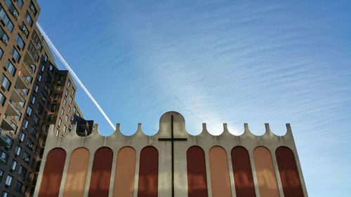 Low angle view of building against blue sky