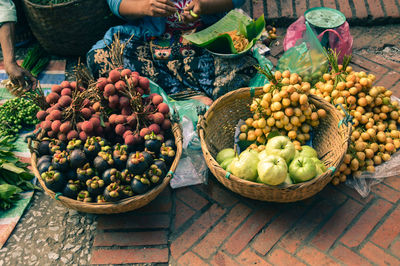High angle view of exotic fruits for sale in luang prabang morning market