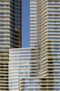 Low angle view of modern buildings in city