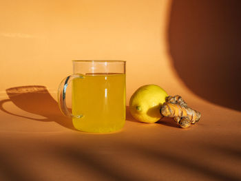 Close-up of fruits in jar on table