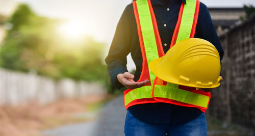 Midsection of man working at construction site