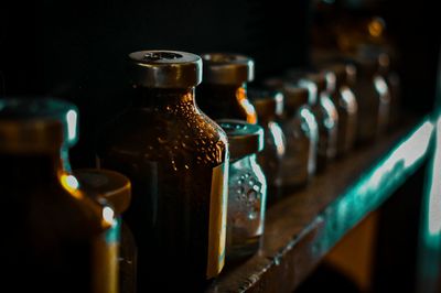 Close-up of medicine bottles on table