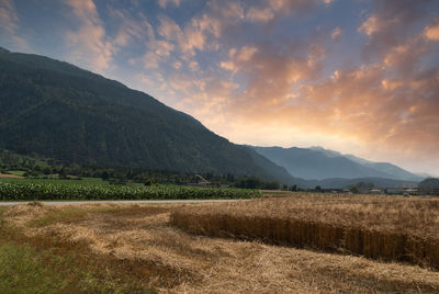 Scenic view of landscape against sky during sunset