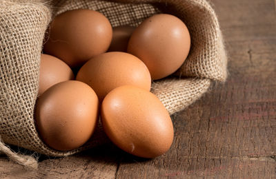 High angle view of eggs in container on table