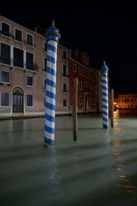 Illuminated buildings in city at night